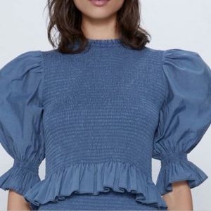 Blue ruffle top